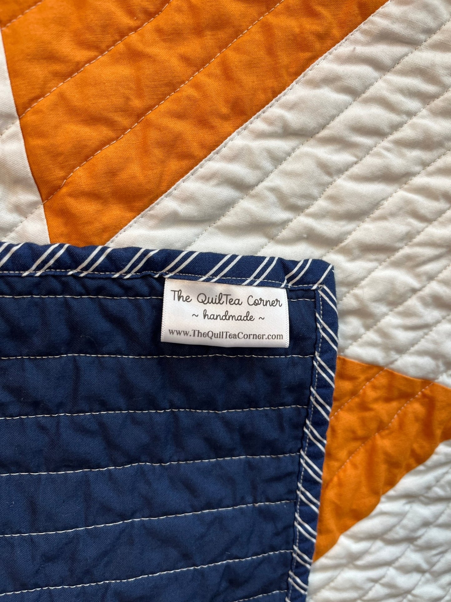 Modern Triangle Baby Quilt – Orange, White, and Navy - The QuilTea Corner