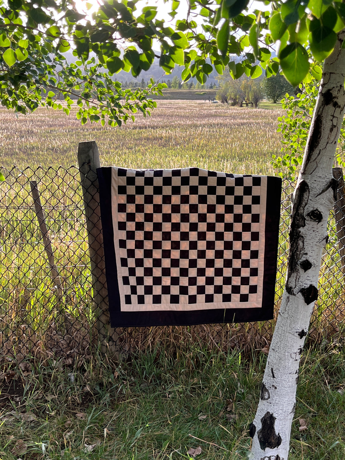 Black and Tan Checkered Ghost Baby Quilt