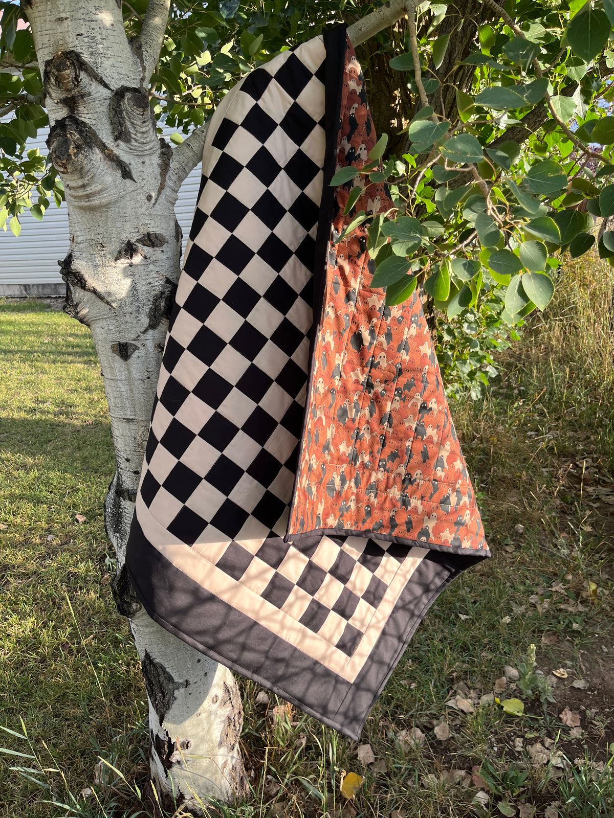 Black and Tan Checkered Ghost Baby Quilt