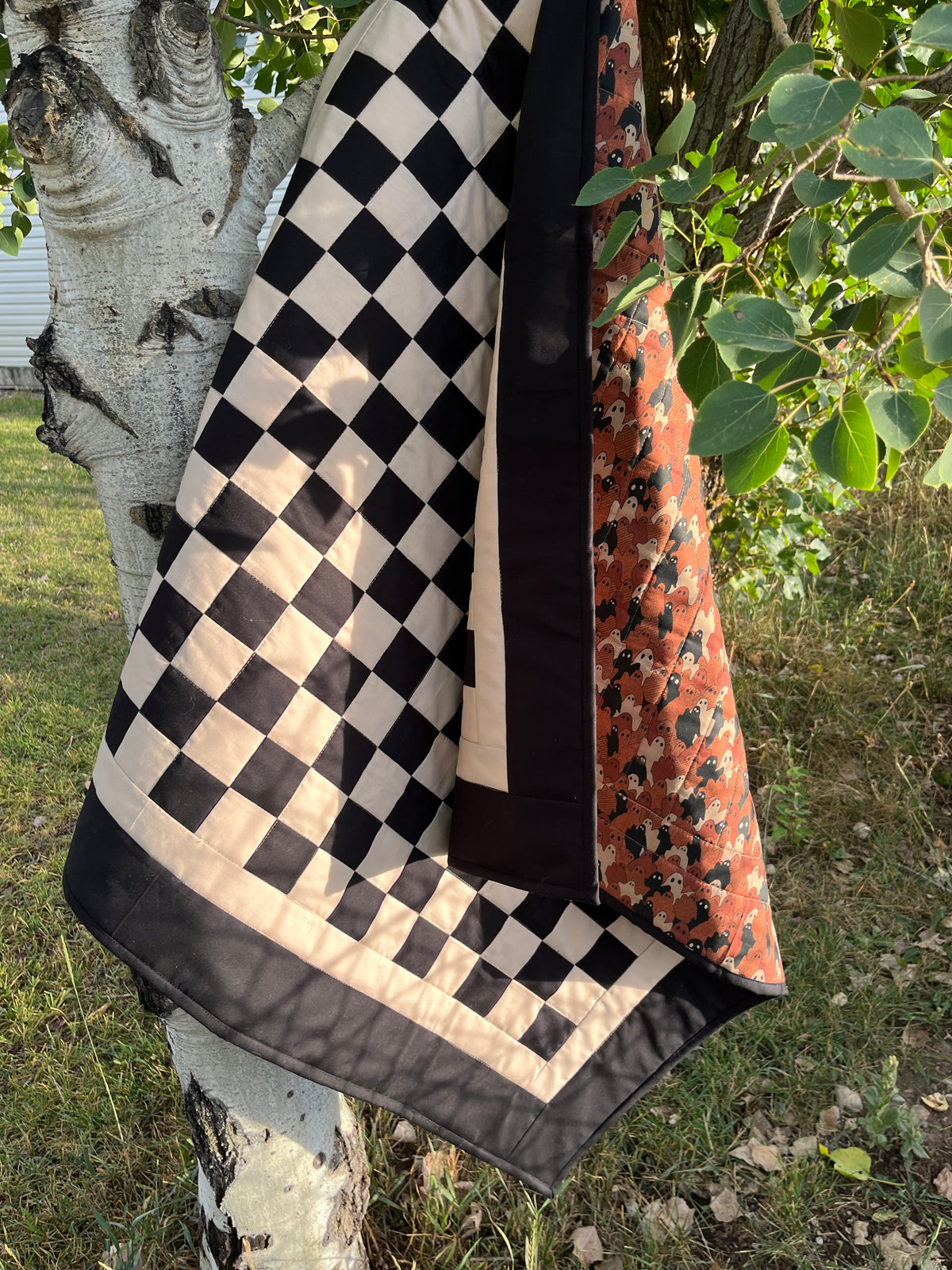 Black and Tan Checkered Ghost Baby Quilt