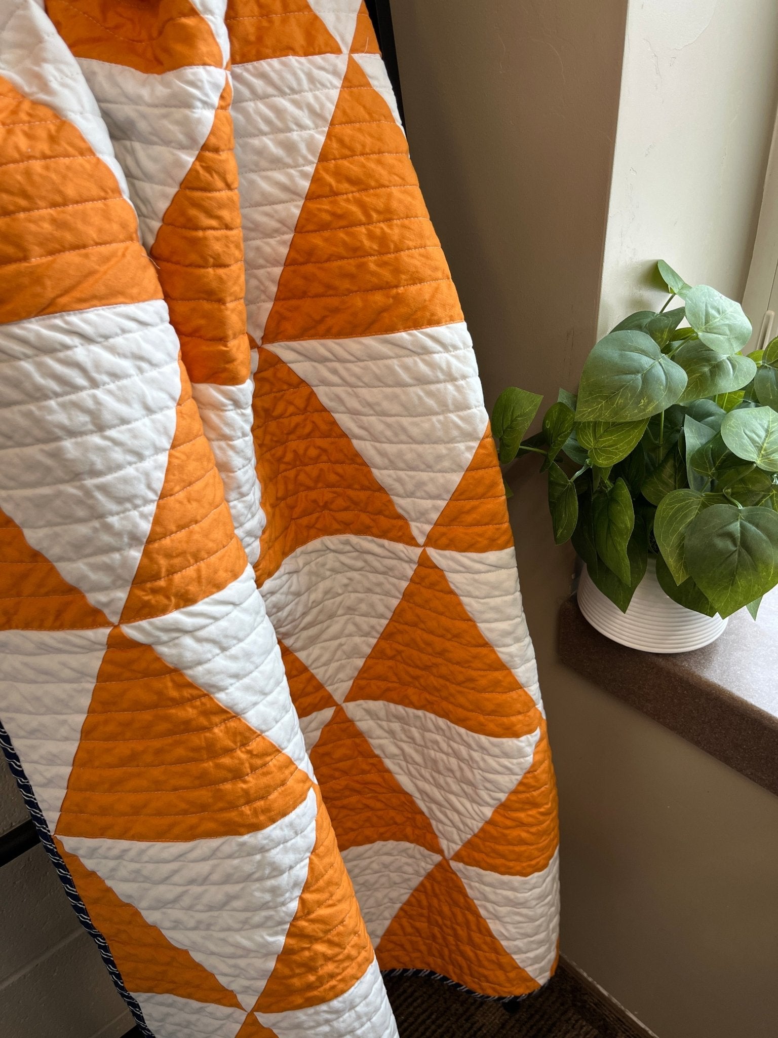 Modern Triangle Baby Quilt – Orange, White, and Navy - The QuilTea Corner