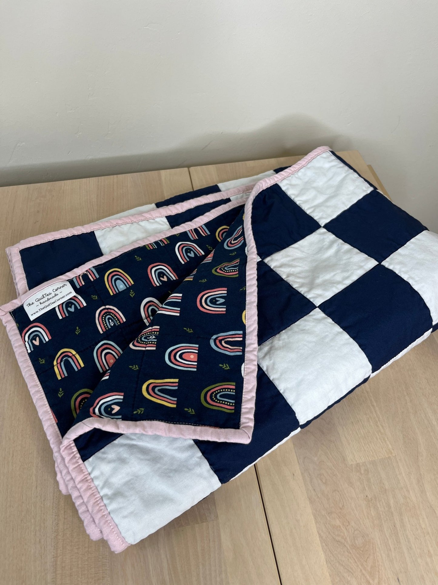 Navy White Checkered Modern Baby Crib Quilt with Boho Rainbow Fabric Backing - The QuilTea Corner