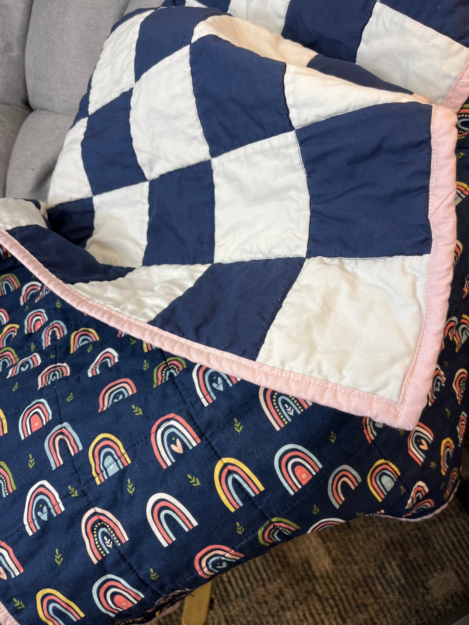 Navy White Checkered Modern Baby Crib Quilt with Boho Rainbow Fabric Backing - The QuilTea Corner