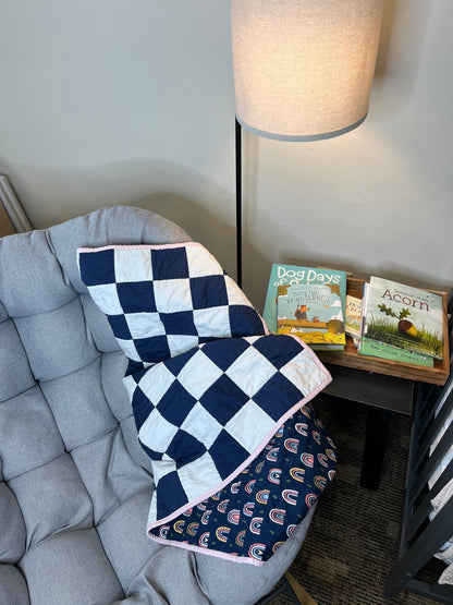 Navy White Checkered Modern Baby Crib Quilt with Boho Rainbow Fabric Backing - The QuilTea Corner
