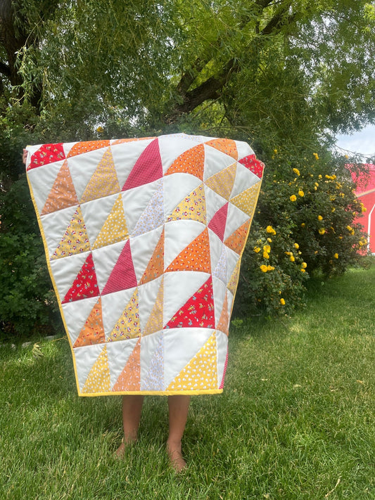 Storytime 30’s Half Square Triangle Handmade Baby Quilt in Orange, Yellow, Red and White Vintage Inspired Nursery Decor - The QuilTea Corner